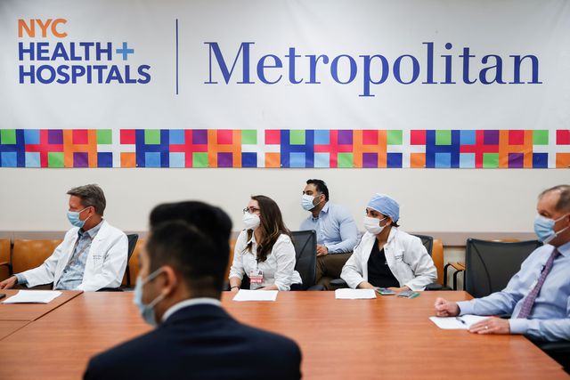 Hospital administrators sit in a meeting at NYC Health + Hospitals, Metropolitan, May 27th, 2020